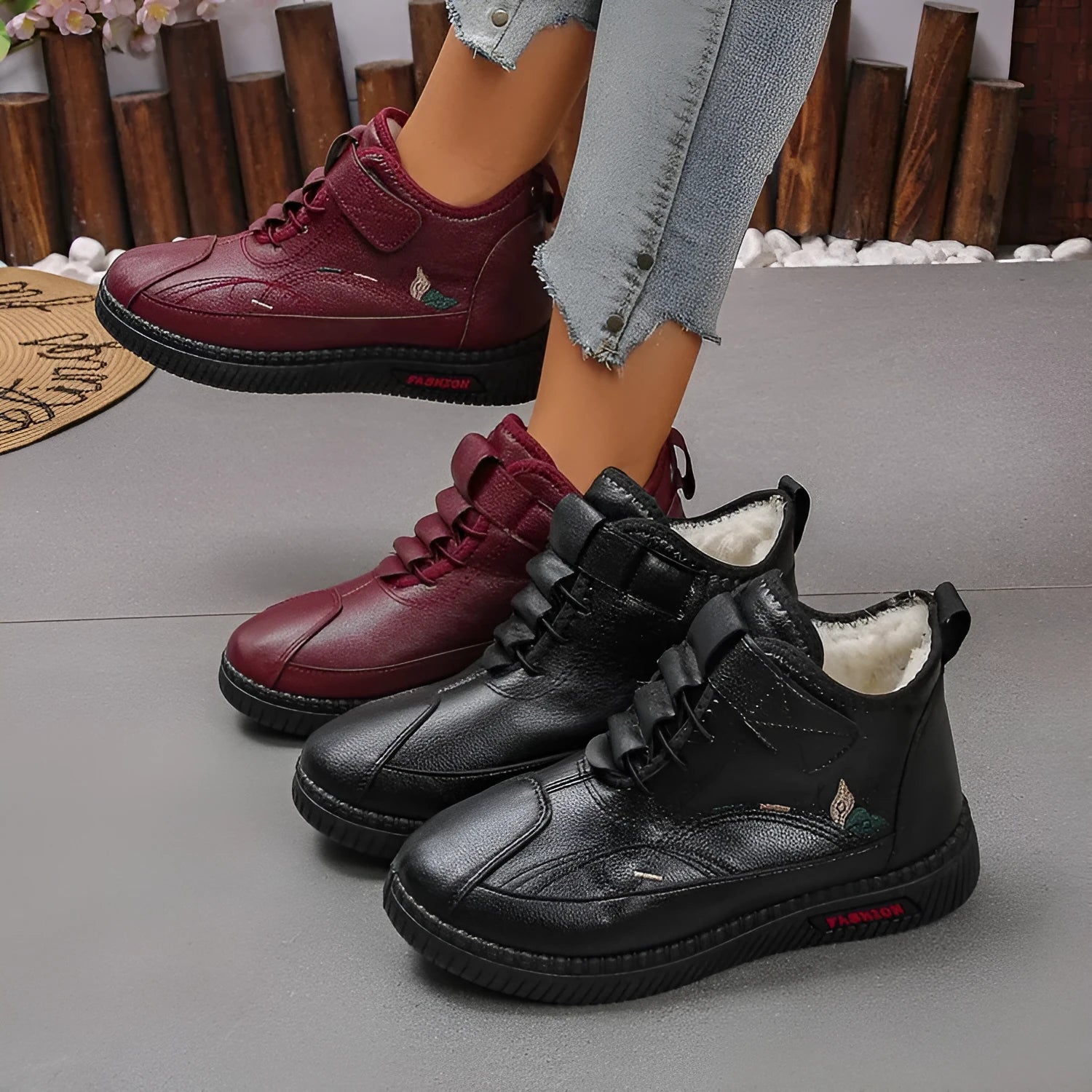 Women's black and red velvet cotton shoes with a hollow-out design and non-slip rubber sole.