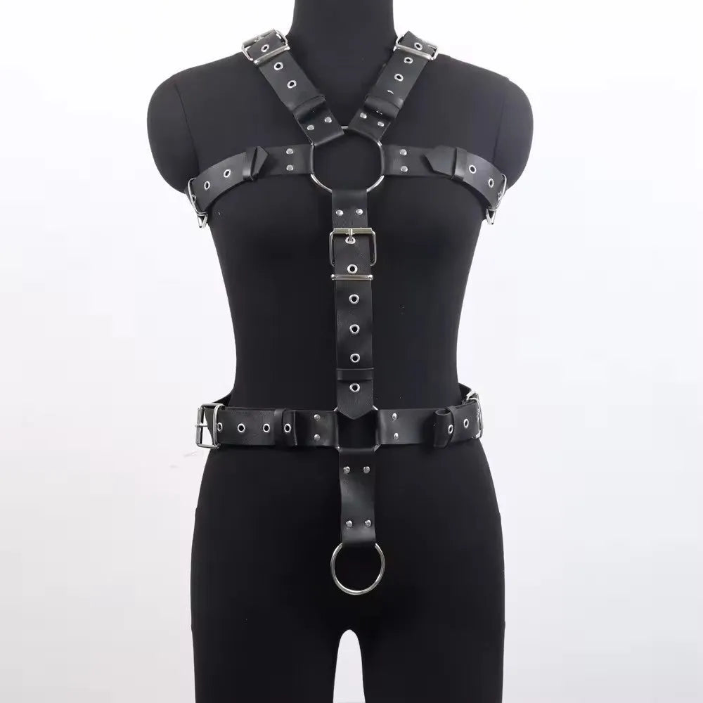 Black patent leather waist cincher shapewear with pin buckle fastening on mannequin