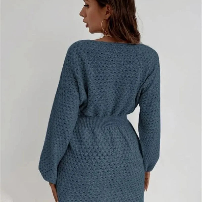 Blue women's knitted dress with hand-crocheted flowers and fitted waist design