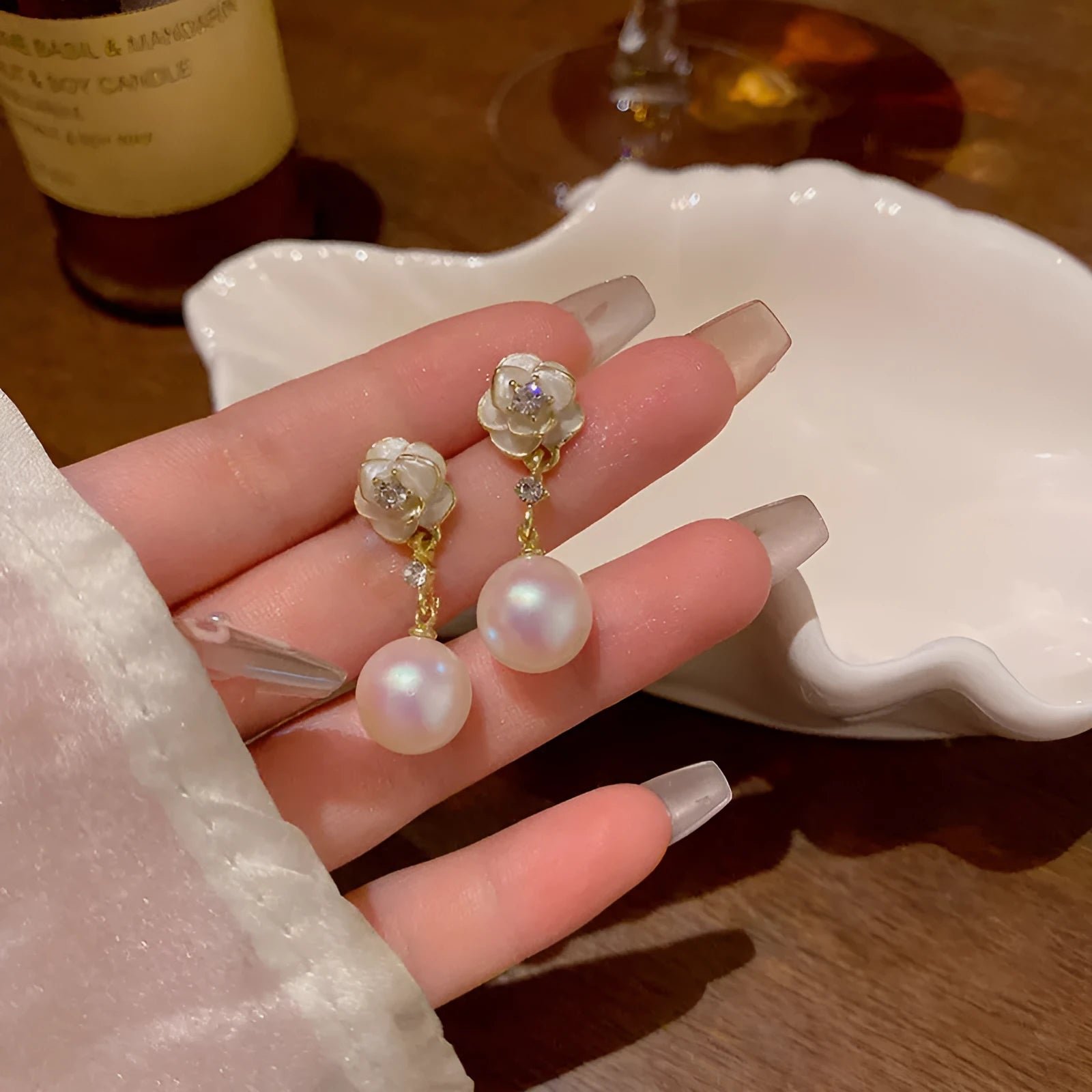 Camellia flower stud earrings for women in alloy metal with floral design