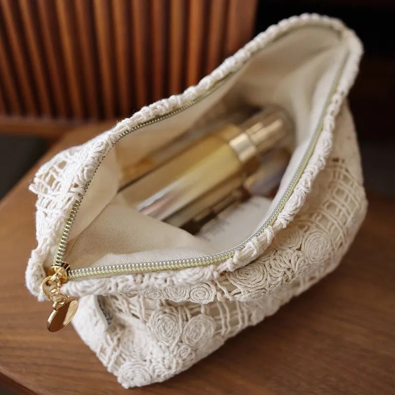Handmade corduroy cosmetic bag with crocheted hollow flowers and ethnic embroidery in solid rope colour