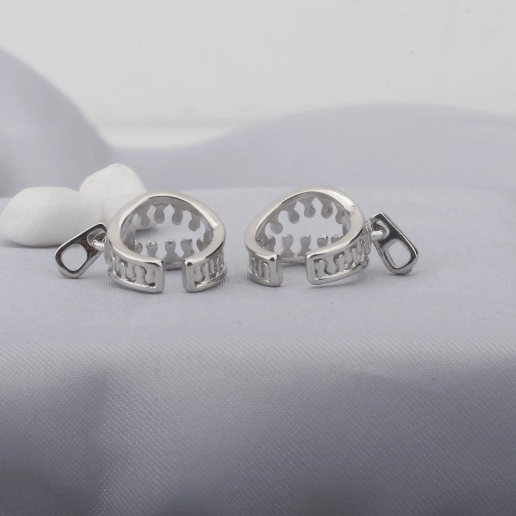 Copper geometric clip-on earrings with line design in ES862 colour.