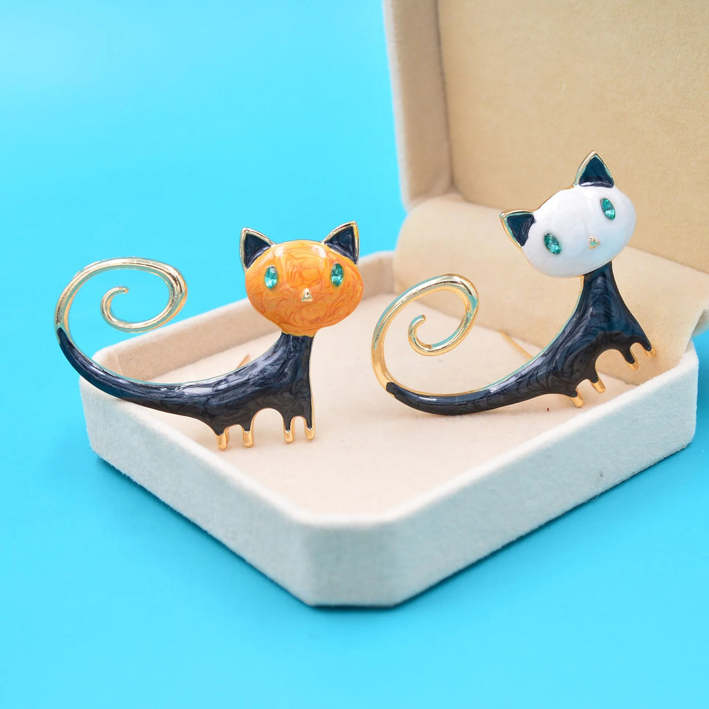 Personalised painted cat tail brooch in orange or white colour with alloy metal construction