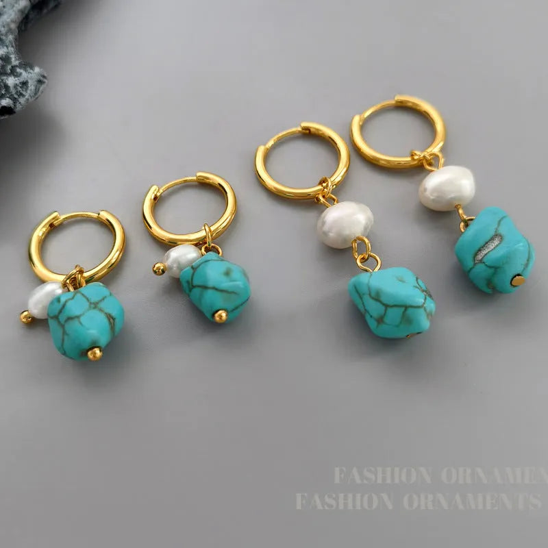 A pair of short and a pair of long turquoise cultured pearl ear clips with geometric copper settings.