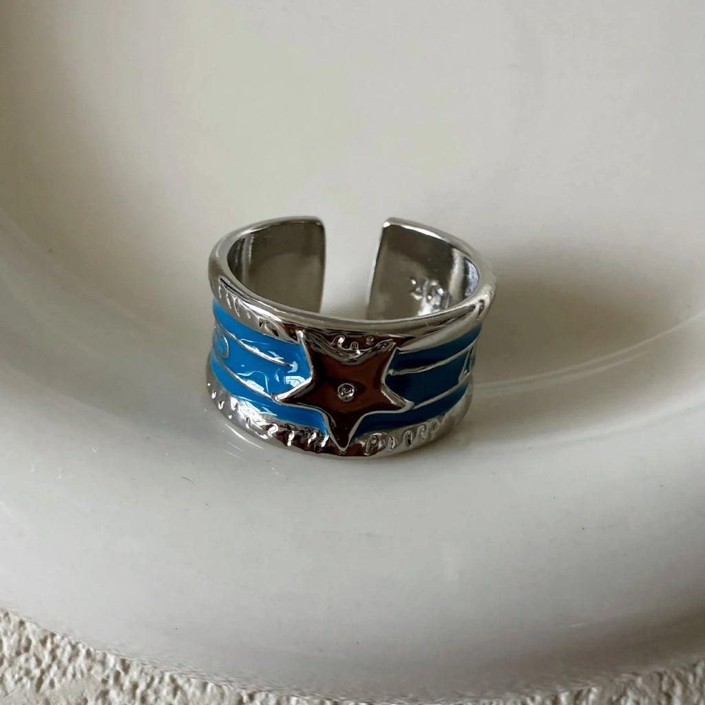Adjustable copper drop oil ring with geometric lines in distressed finish