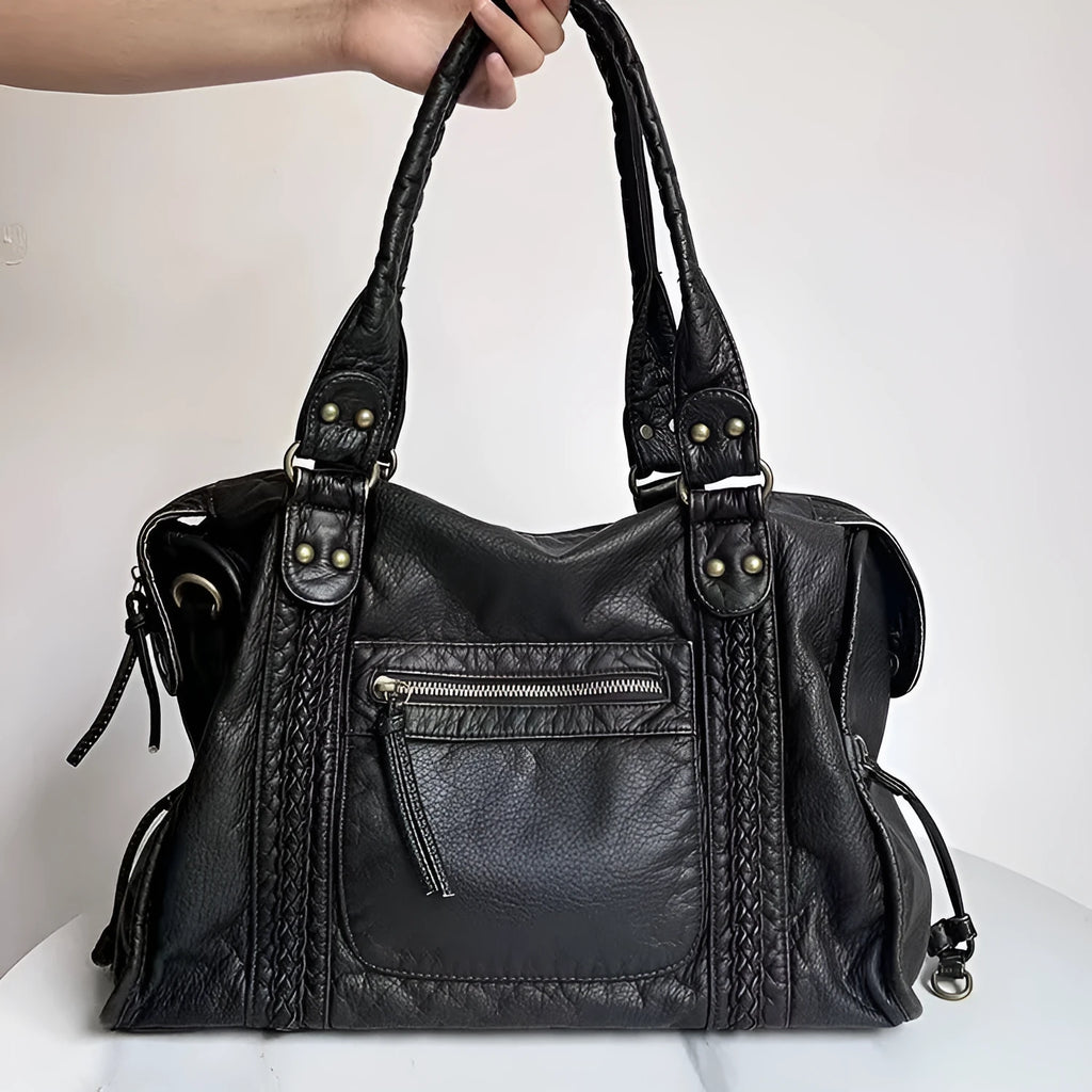 Women's French retro motorcycle style messenger shoulder bag in soft PU leather with woven detailing