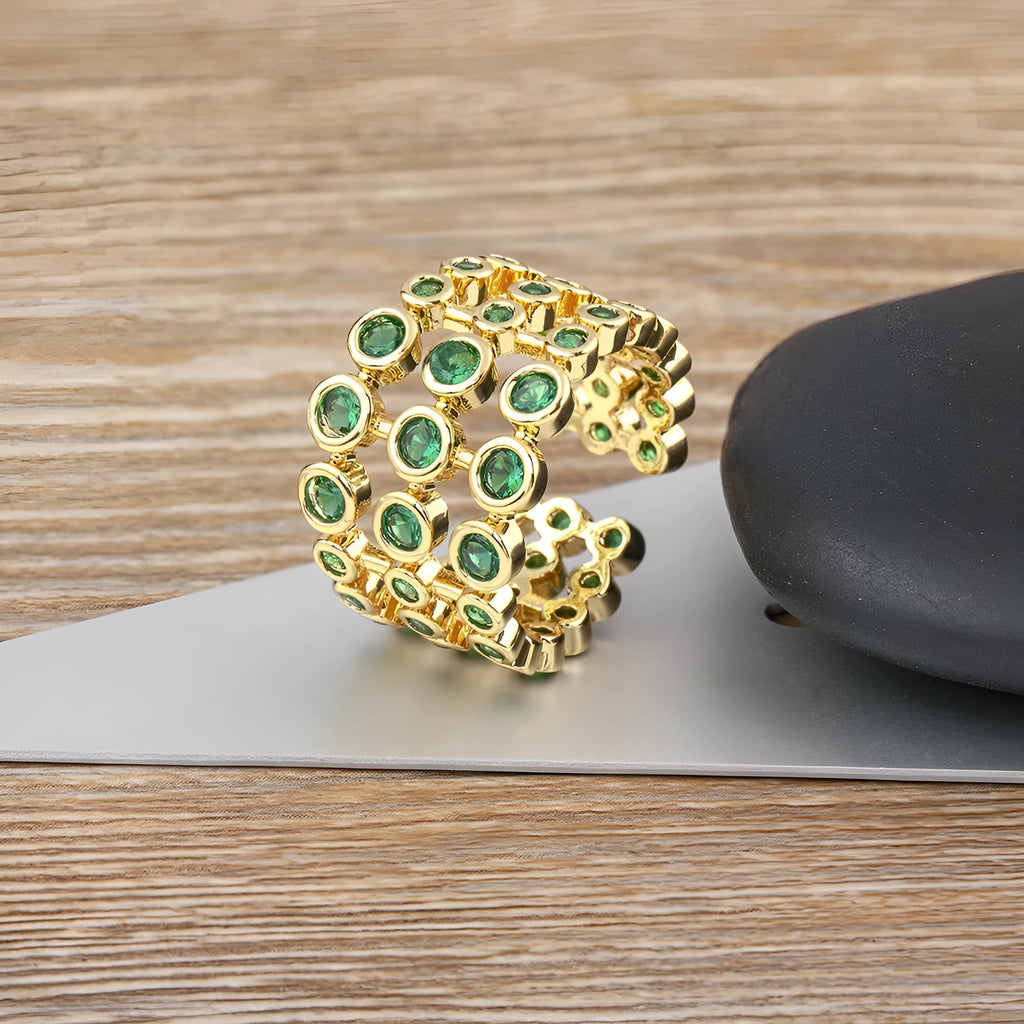 Copper ring with 18K gold plating and three-layer green zircon design in wide band version
