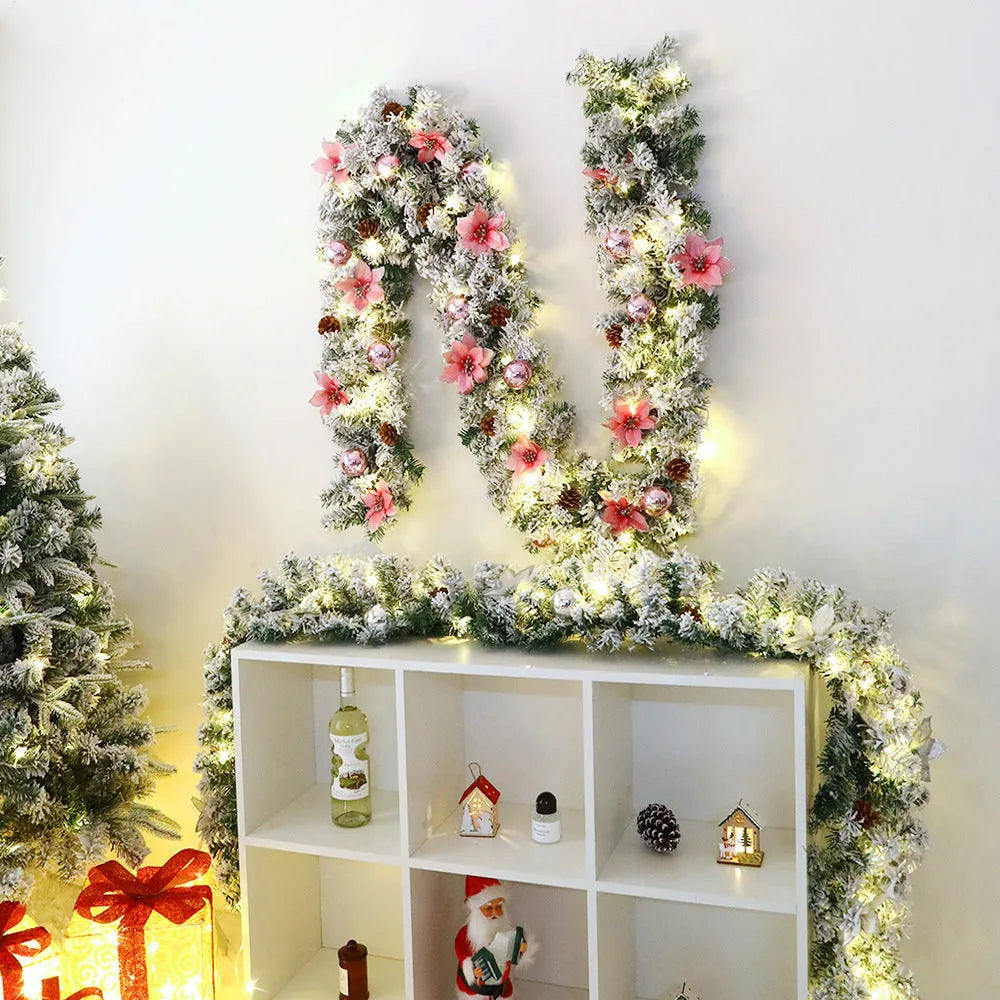 PVC Christmas rattan garland with flocking in red, hung on a door