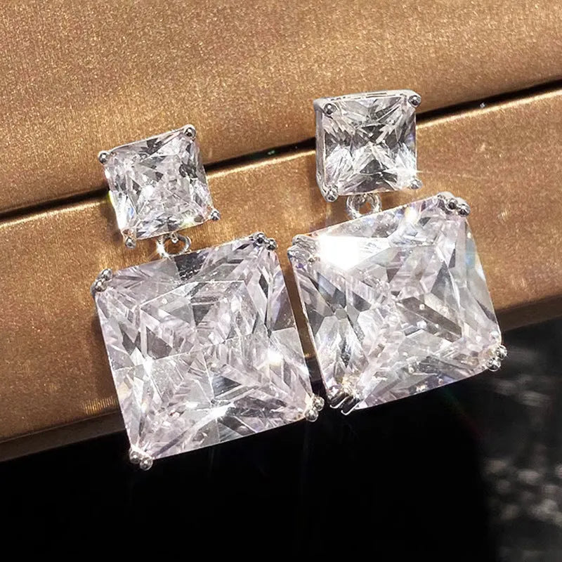 Geometric square copper earrings with gold finish and quadrilateral design