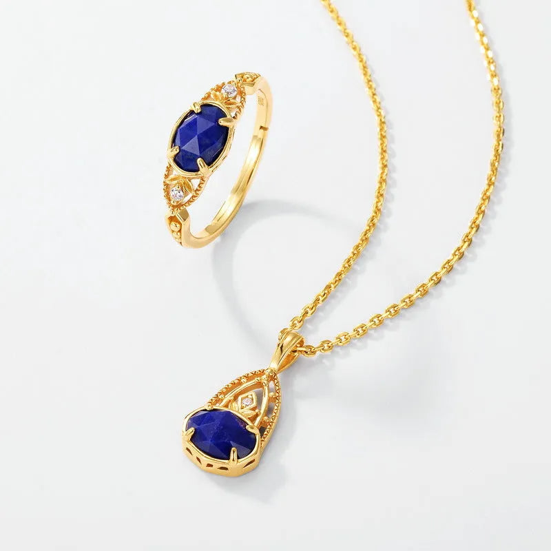 Silver alloy geometric ellipse ring with a deep blue lapis lazuli stone, Japanese style.