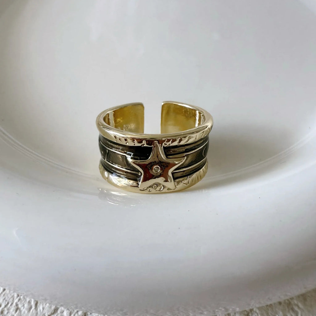 Adjustable copper drop oil ring with geometric lines in distressed finish
