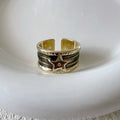 Adjustable copper drop oil ring with geometric lines in distressed finish