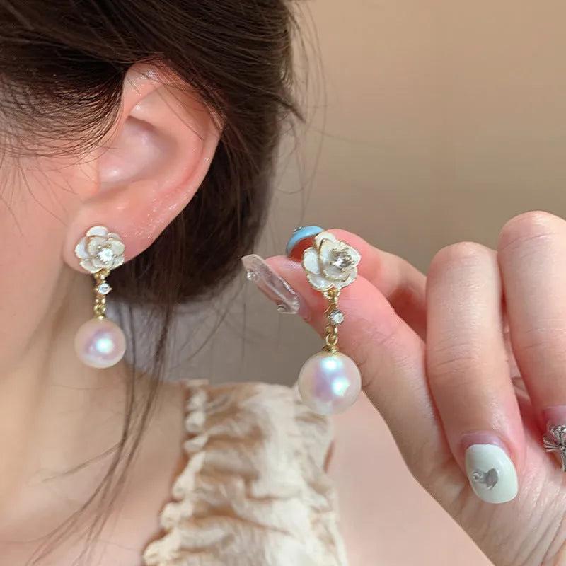 Camellia flower stud earrings for women in alloy metal with floral design