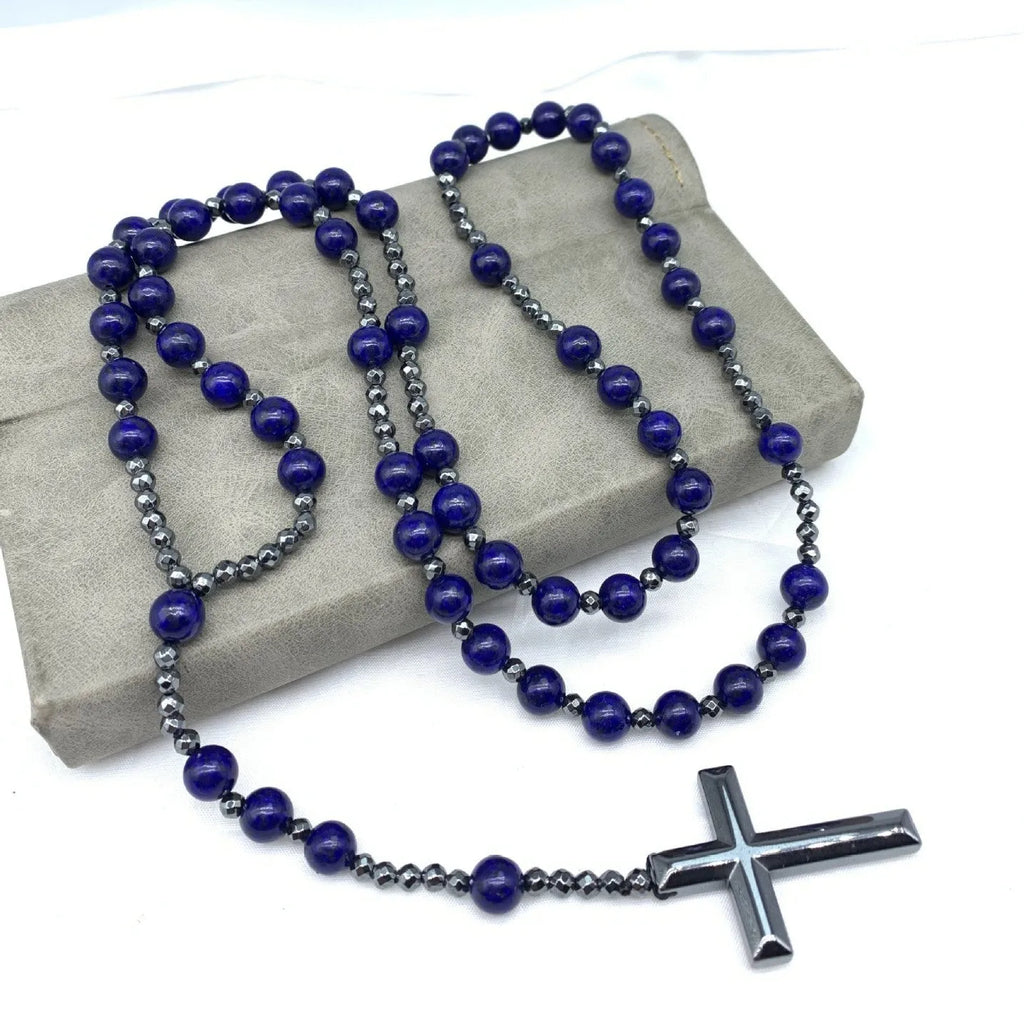 Men's stone necklace with a geometric cross pendant on a ball bead chain, showing the safety lock clasp.