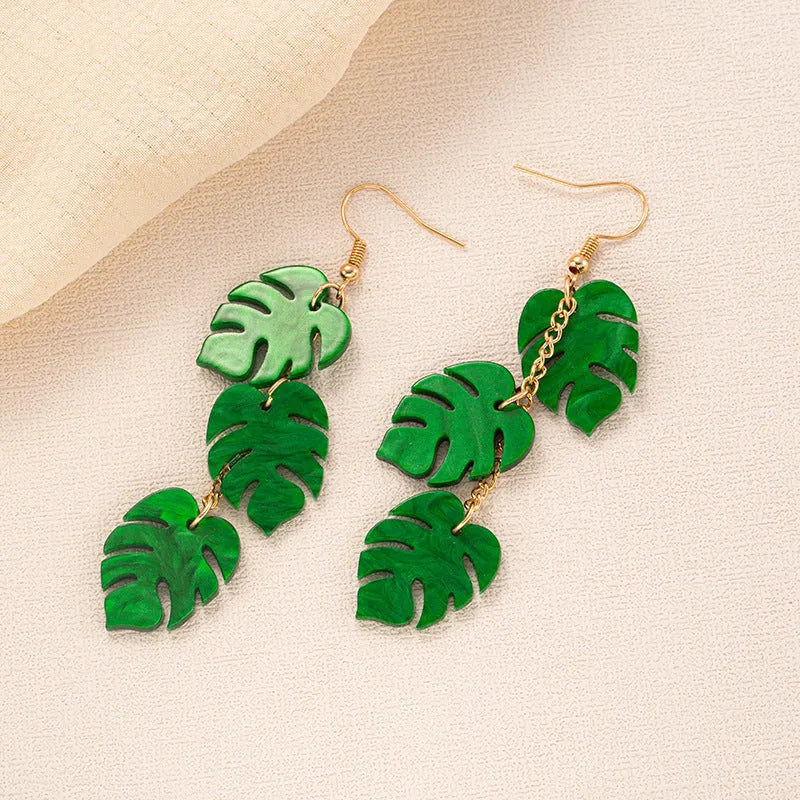 Acrylic drop-shaped summer coconut design earrings with alloy hooks in one of five colour styles.