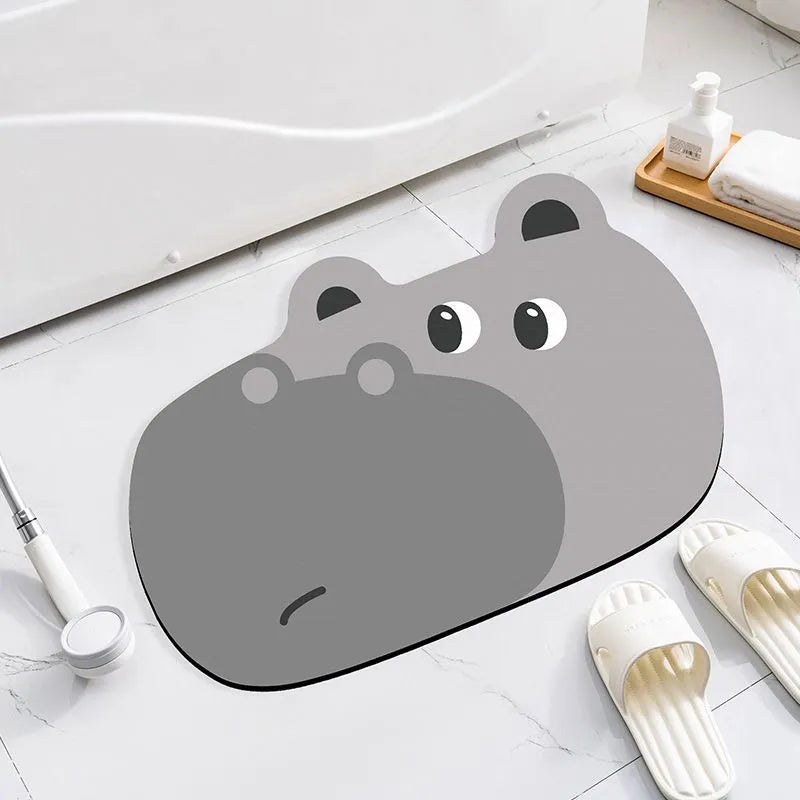 Diatomite absorbent bathroom mat with cartoon animal design in one of three available sizes