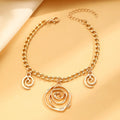 Spiral donut jewellery set with necklace, bracelet and earrings showing geometric circle designs in gold and silver finishes