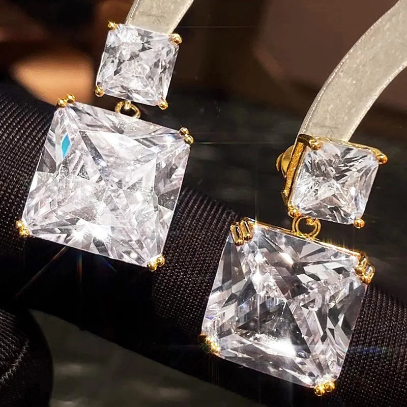 Geometric square copper earrings with gold finish and quadrilateral design