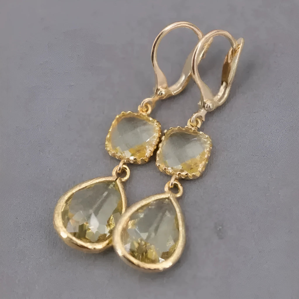 Gold geometric long fringe earrings with water droplet crystals on copper with electroplated finish