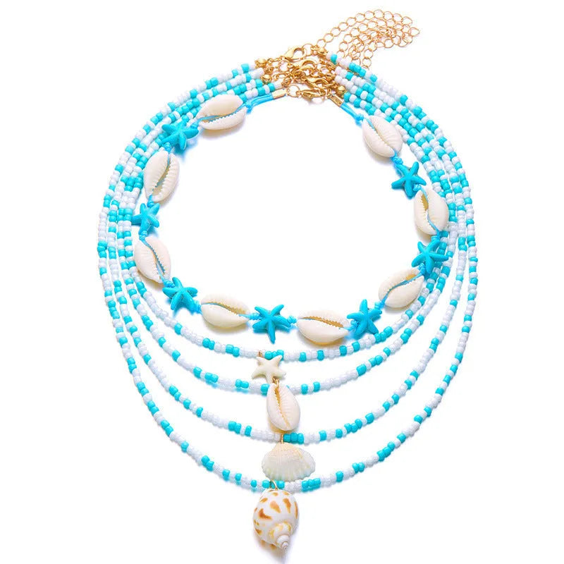 Women's multi-layer necklace set with starfish and shell pendants in blue and assorted colours
