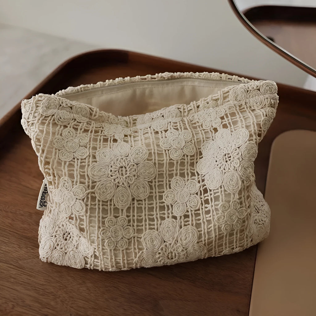 Handmade corduroy cosmetic bag with crocheted hollow flowers and ethnic embroidery in solid rope colour