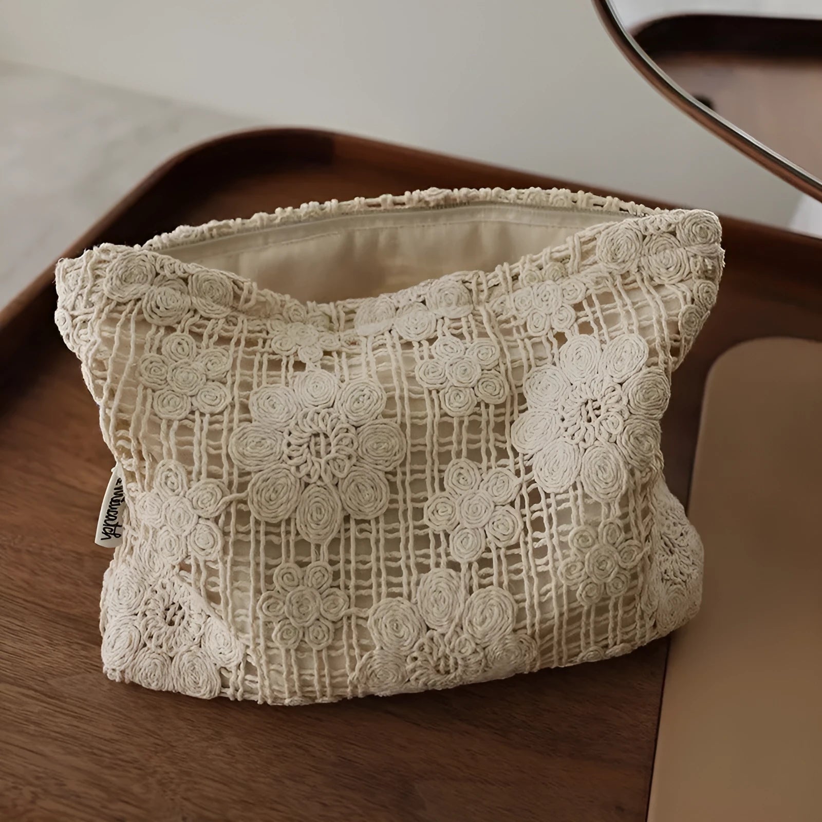 Handmade corduroy cosmetic bag with crocheted hollow flowers and ethnic embroidery in solid rope colour