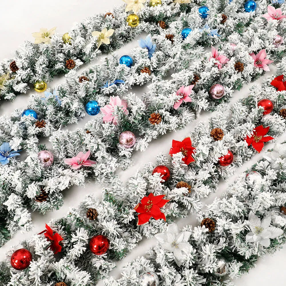 PVC Christmas rattan garland with flocking in red, hung on a door