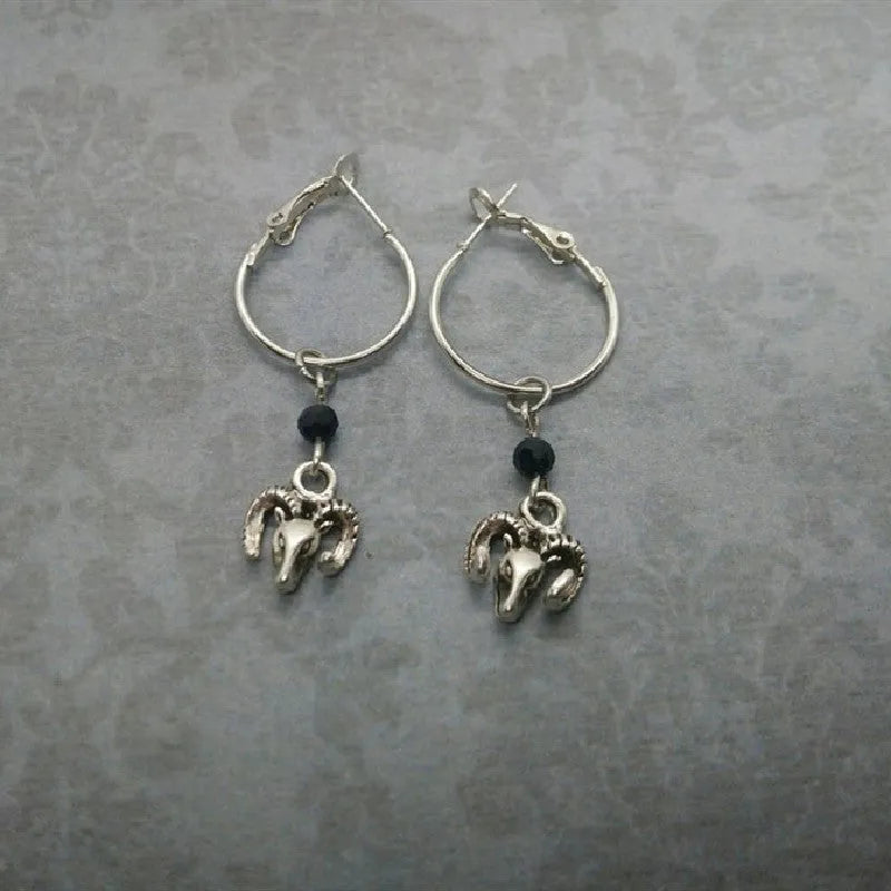 Silver colour round ring earrings with Tibetan antelope style decoration