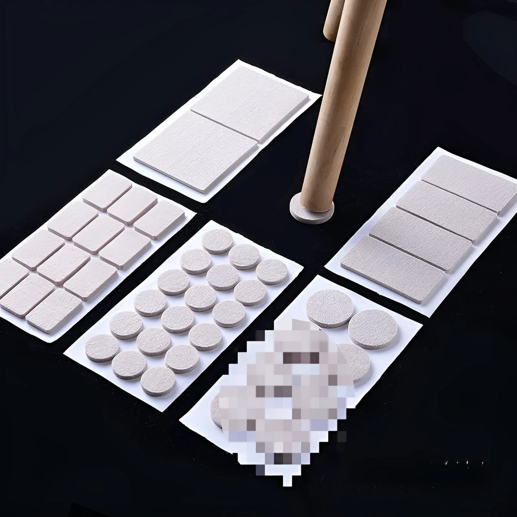 Assorted beige plastic chair leg stoppers in round and square shapes on a wooden floor.