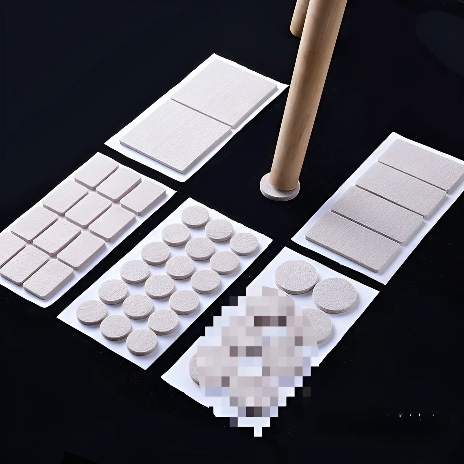 Assorted beige plastic chair leg stoppers in round and square shapes on a wooden floor.