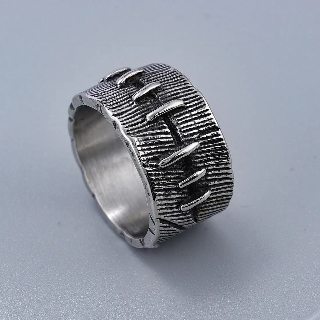 Dark punk titanium steel double ring with geometric U-shape design in retro colour on size guide background