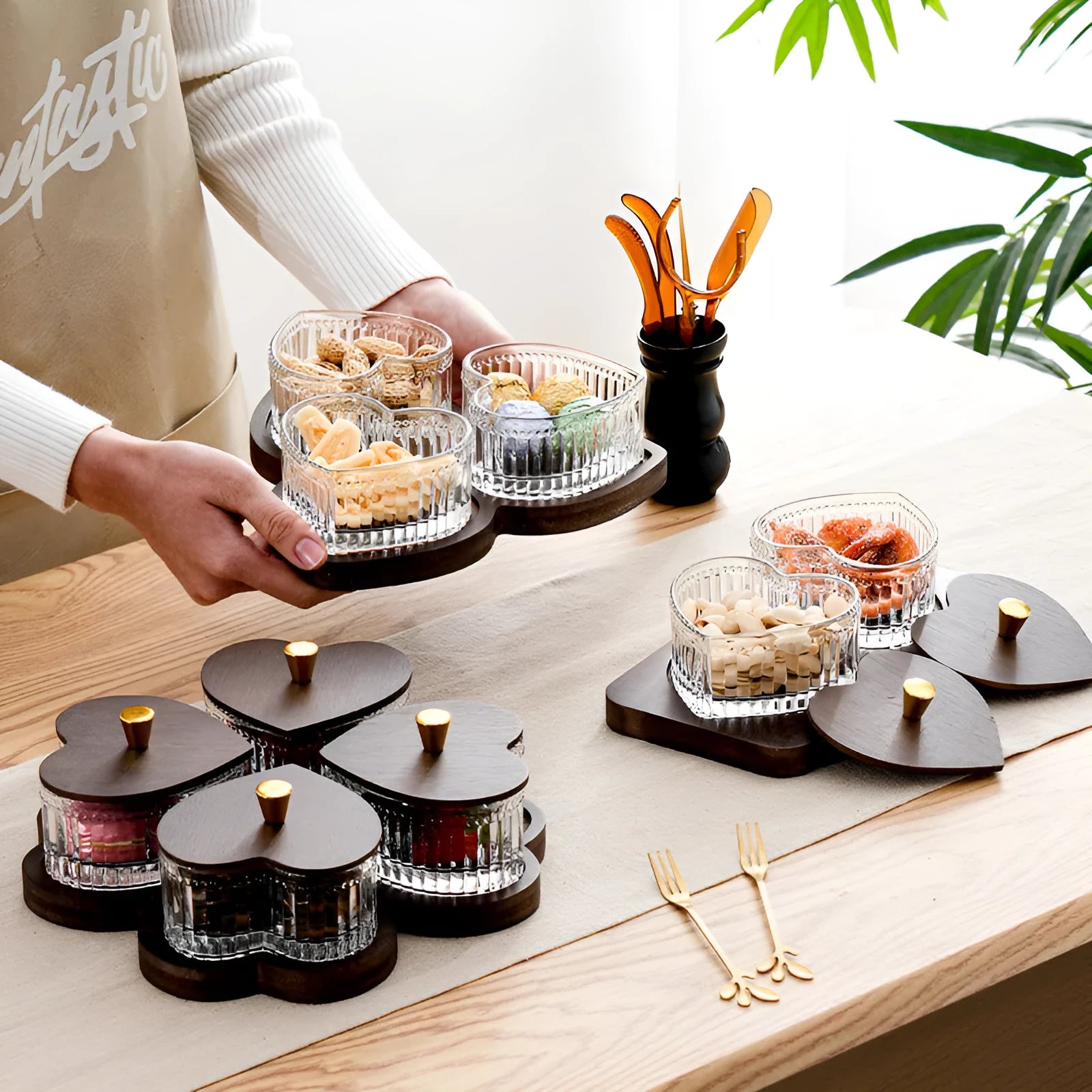 Glass snack platter with heart-shaped bowl lid compartments in mild luxury retro style