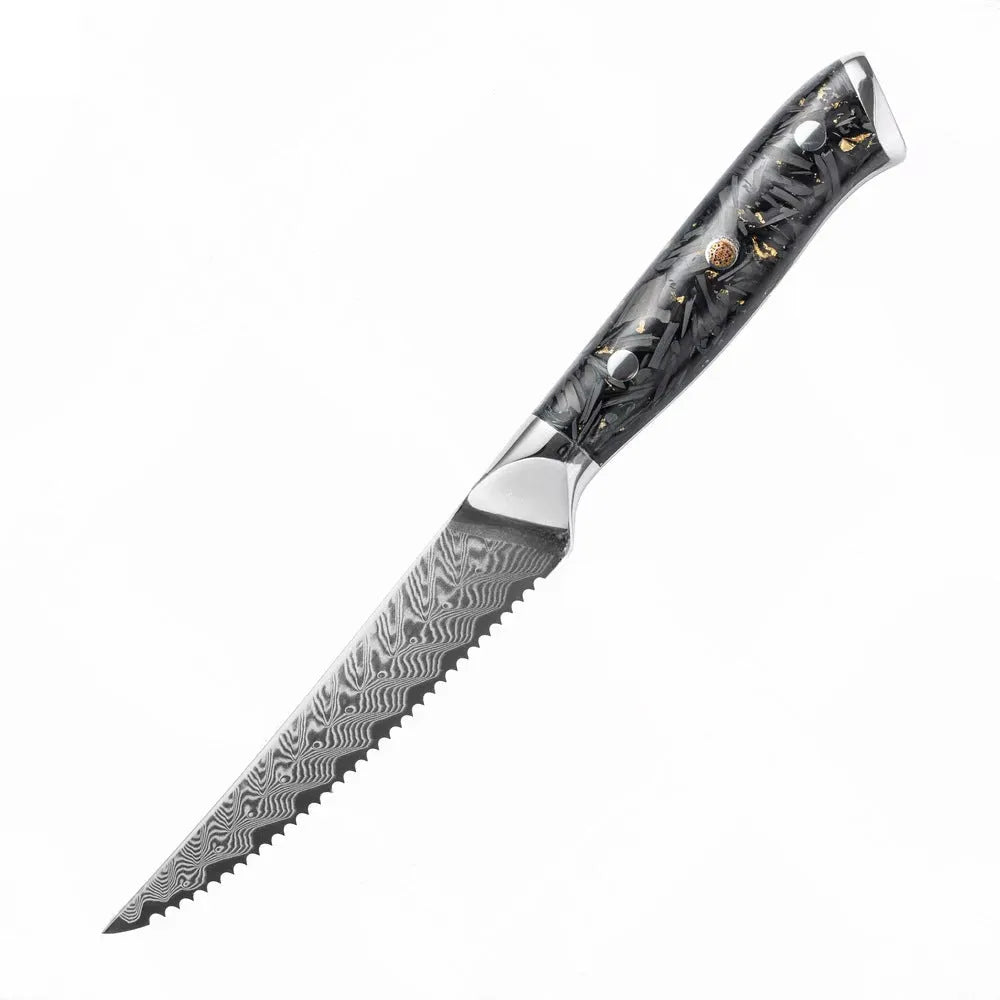 Damascus steel kitchen knife set with eight blades including Japanese and boning knives on a wooden surface