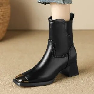 Brown high-heel Martin ankle boots with side zip and metal decoration on cowhide leather.
