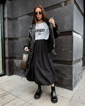 Women's cotton long skirt with elastic waistband in black solid colour A-line design