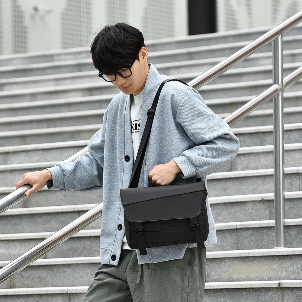 Men's black shoulder bag with large capacity, Derm material, visible sewing line detail, urban simplicity style