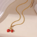 Stainless steel strawberry pendant necklace with alloy chain in red and white gradient colours