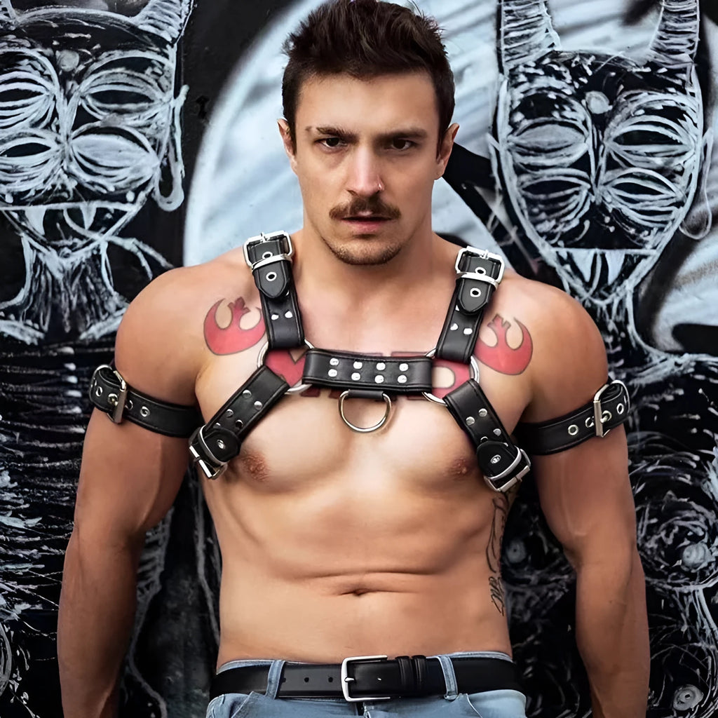 Black leather men's chest strap with metal adjustment buckle and rivets