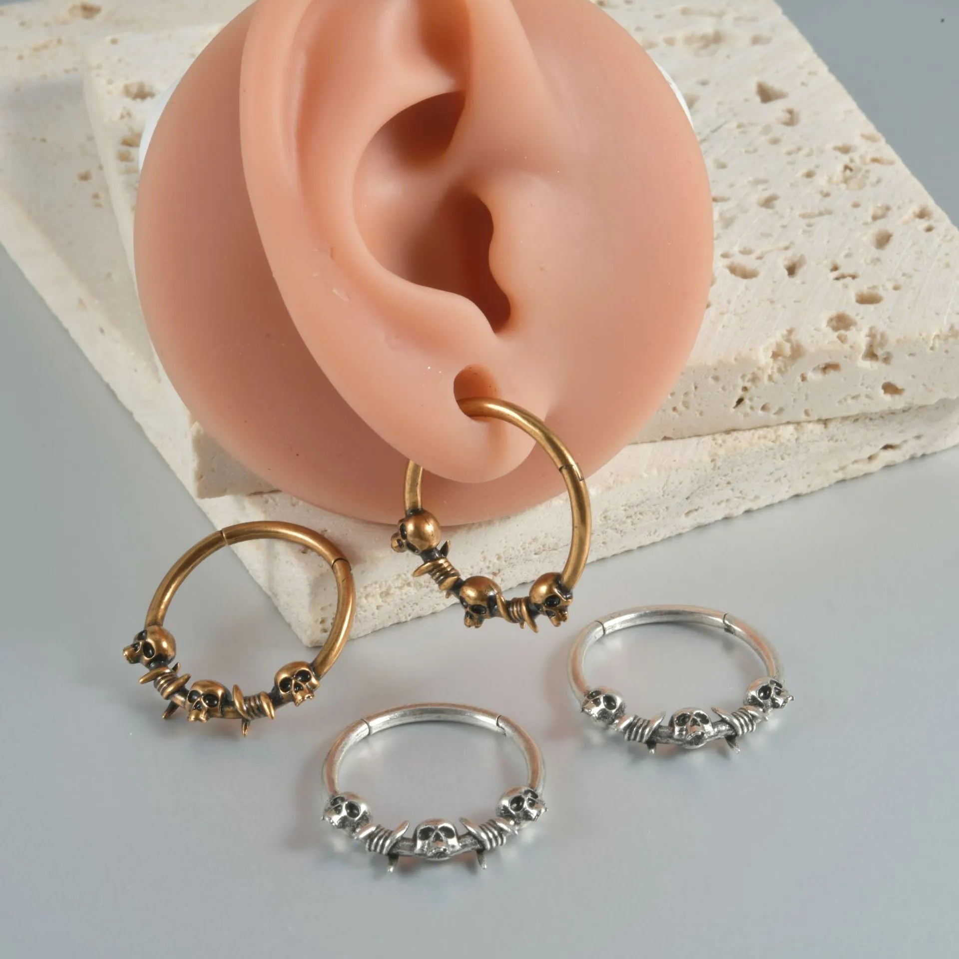 Copper punk earring with ghost head design in antique silver finish