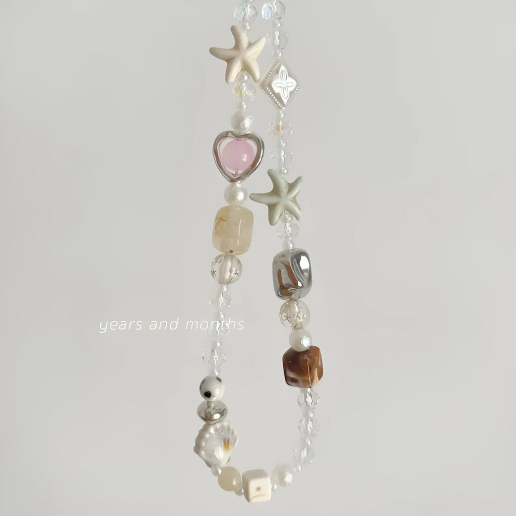 Bohemian beaded mobile phone charm in Island Sweetheart colour, alloy construction