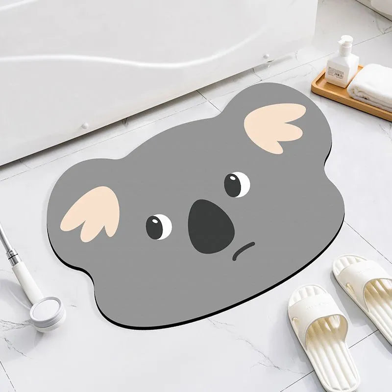 Diatomite absorbent bathroom mat with cartoon animal design in one of three available sizes
