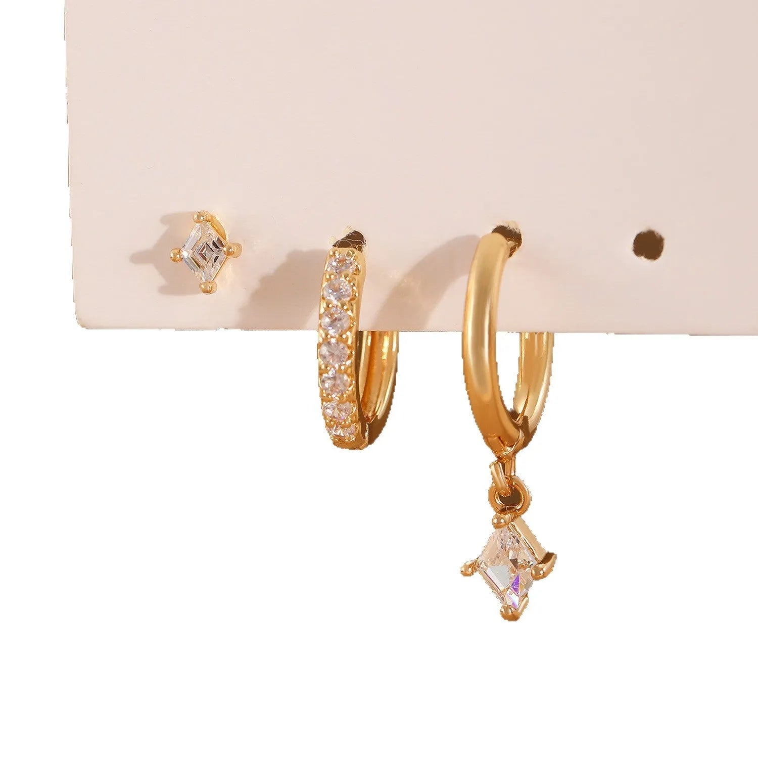 Geometric zircon earring three-piece set showing ear rings, stud earrings, and ear clasps with rhombus patterns