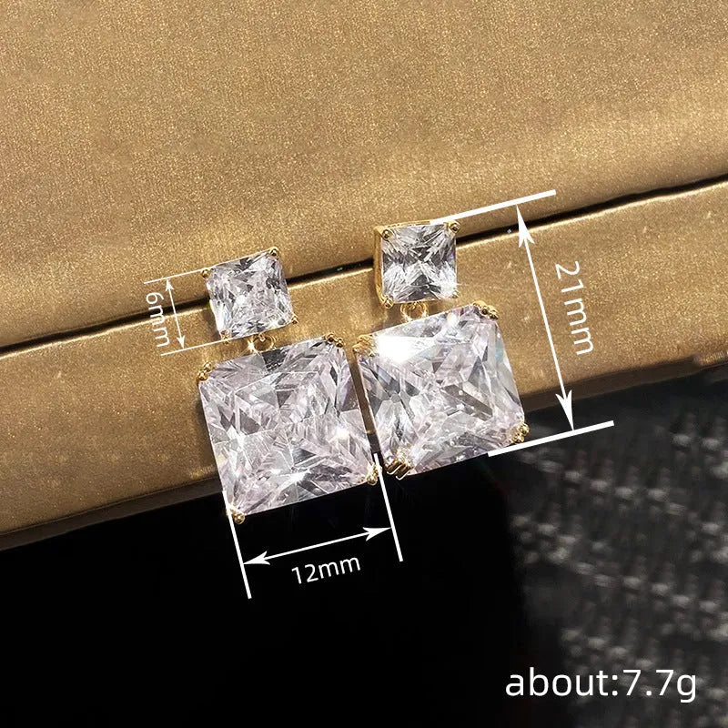 Geometric square copper earrings with gold finish and quadrilateral design