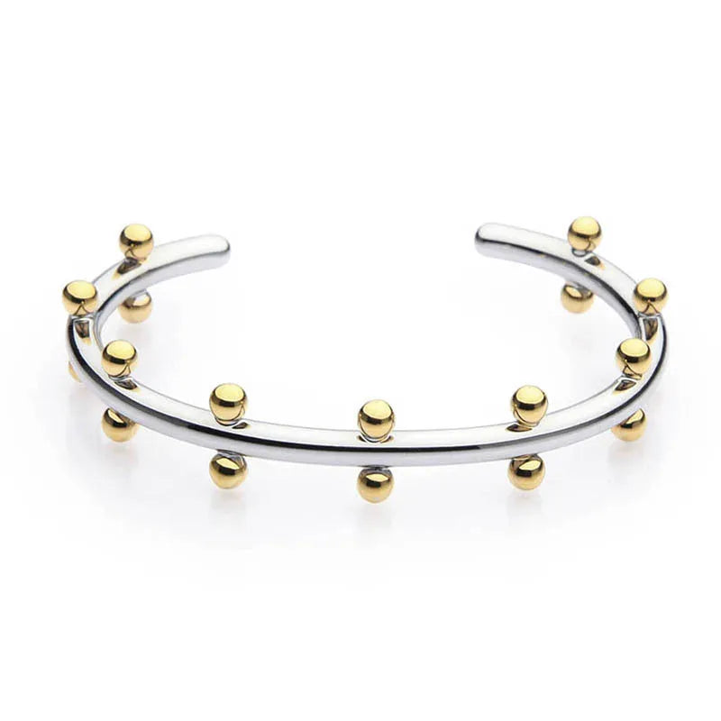 Stainless steel C-shaped bean bead with textured rivet surface in gold colour