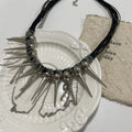 Round rivet bead winding tassel leather necklace in picture colour with electroplated finish.