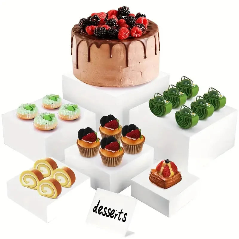 White plastic suit cube dessert display stand set with six tiered racks for bakery counter.