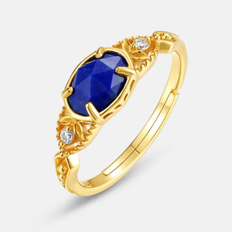 Silver alloy geometric ellipse ring with a deep blue lapis lazuli stone, Japanese style.