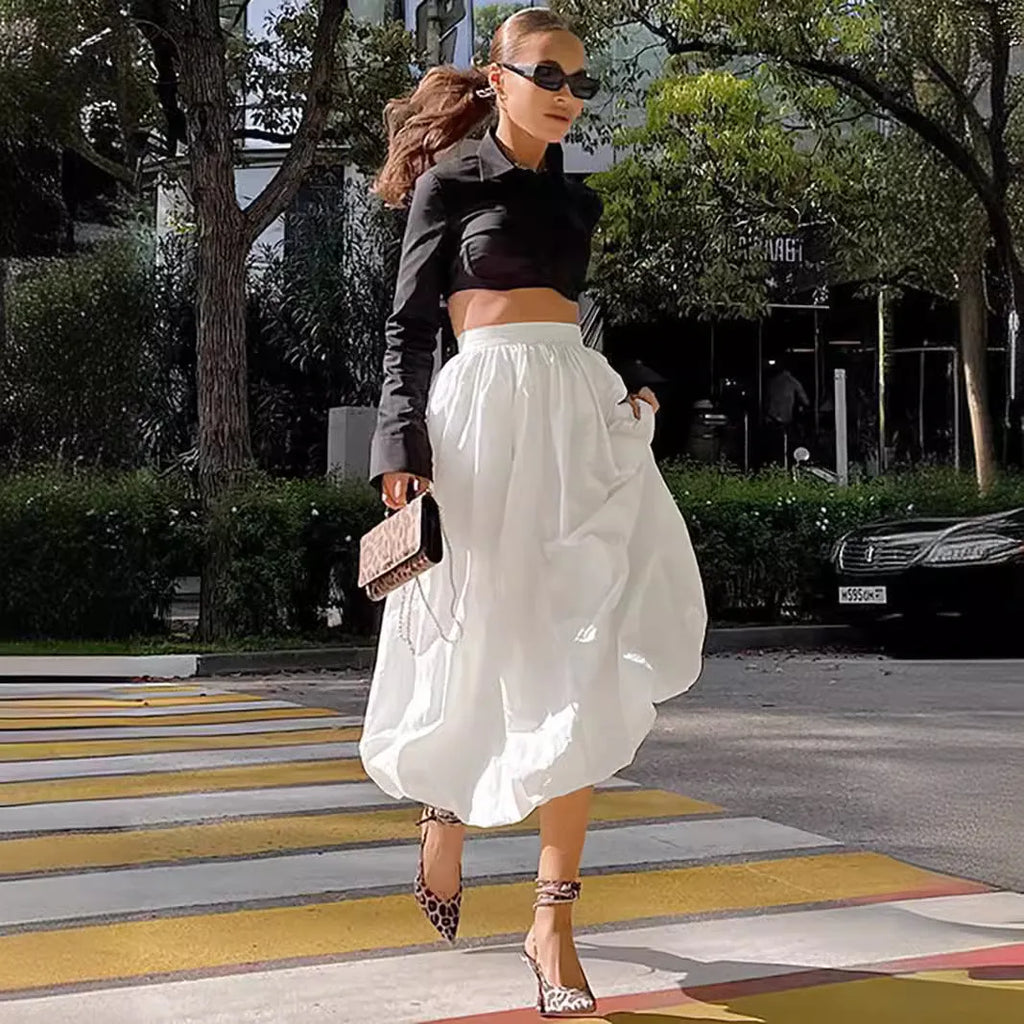 Women's cotton long skirt with elastic waistband in black solid colour A-line design