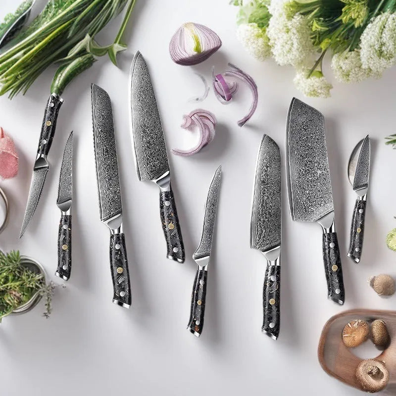 Damascus steel kitchen knife set with eight blades including Japanese and boning knives on a wooden surface
