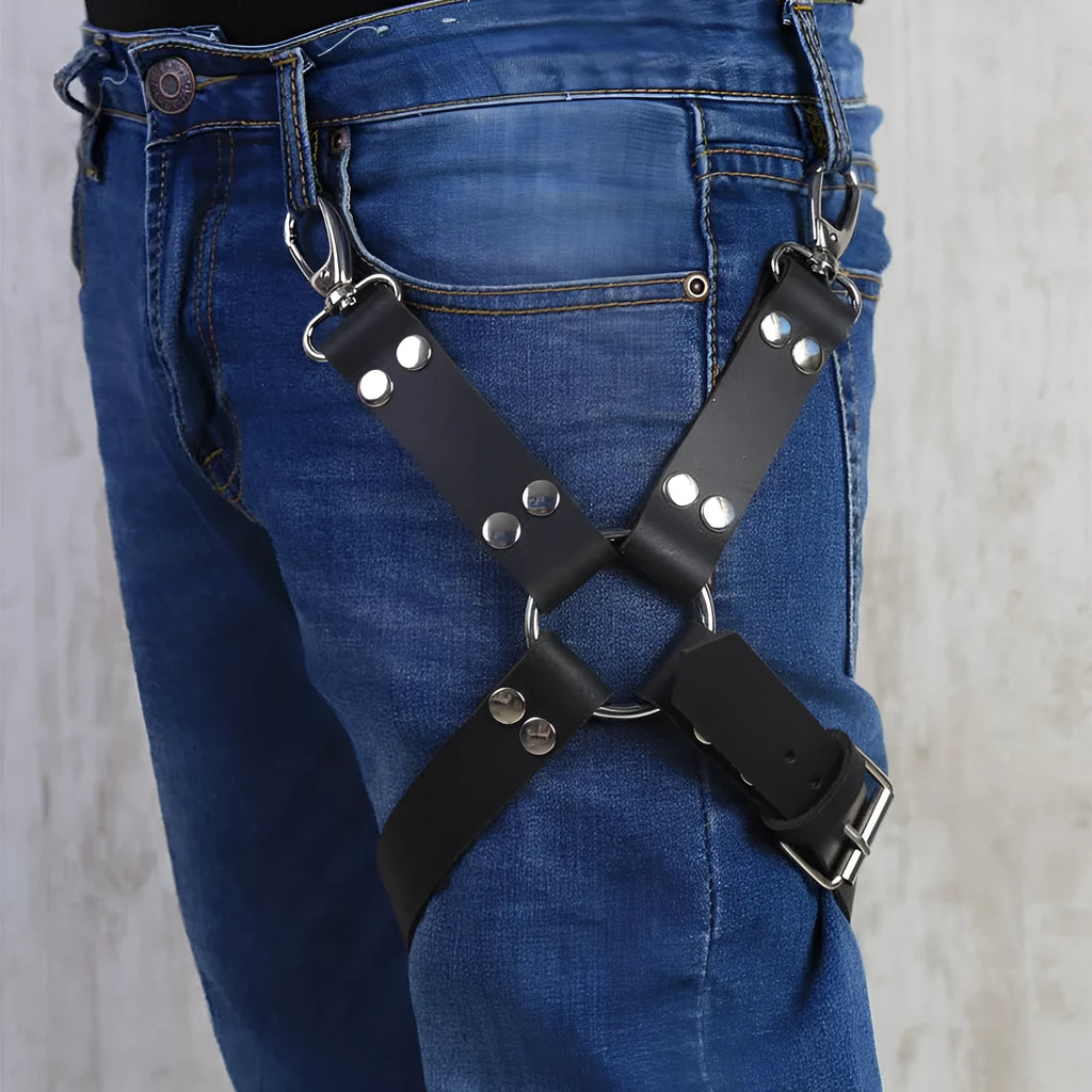 Black PU leather women's leggings on a hanger.